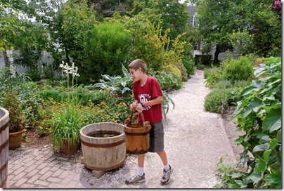 110719356tb Luke carrying bucket of water at Williamsburg