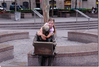 110724857tb Katie hugging bronze statue